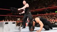 Image result for wwe brock lesnar beats roman on raw